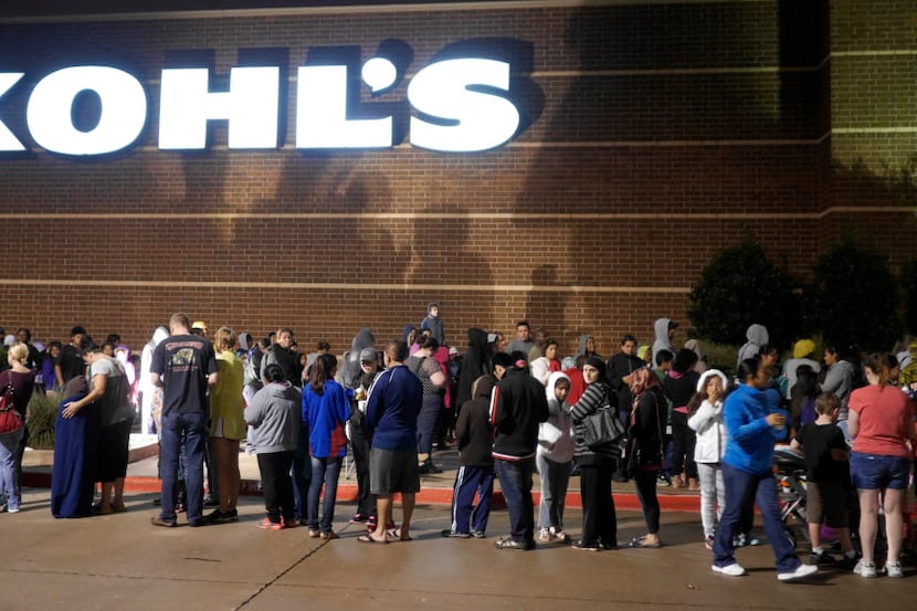 Hundreds of families lined up for a Kohl's store promotion in Frisco in 2014. The retailer...