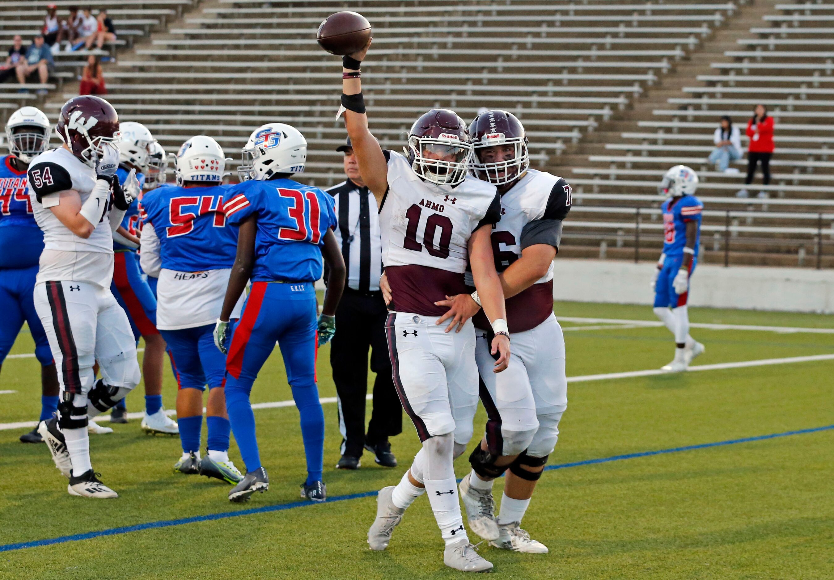 Wylie High RB Layne Chapman (10) and teammate Ralston Ulmer (76) celebrate after Chapman’s...