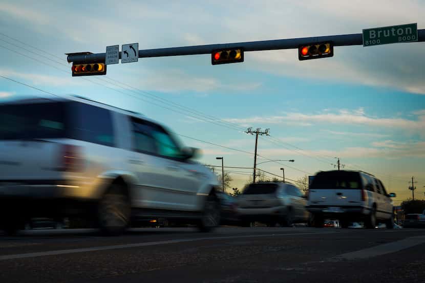 Cars run a red light at  South Buckner Boulevard and Bruton Road on Friday, Feb. 7, 2020, in...