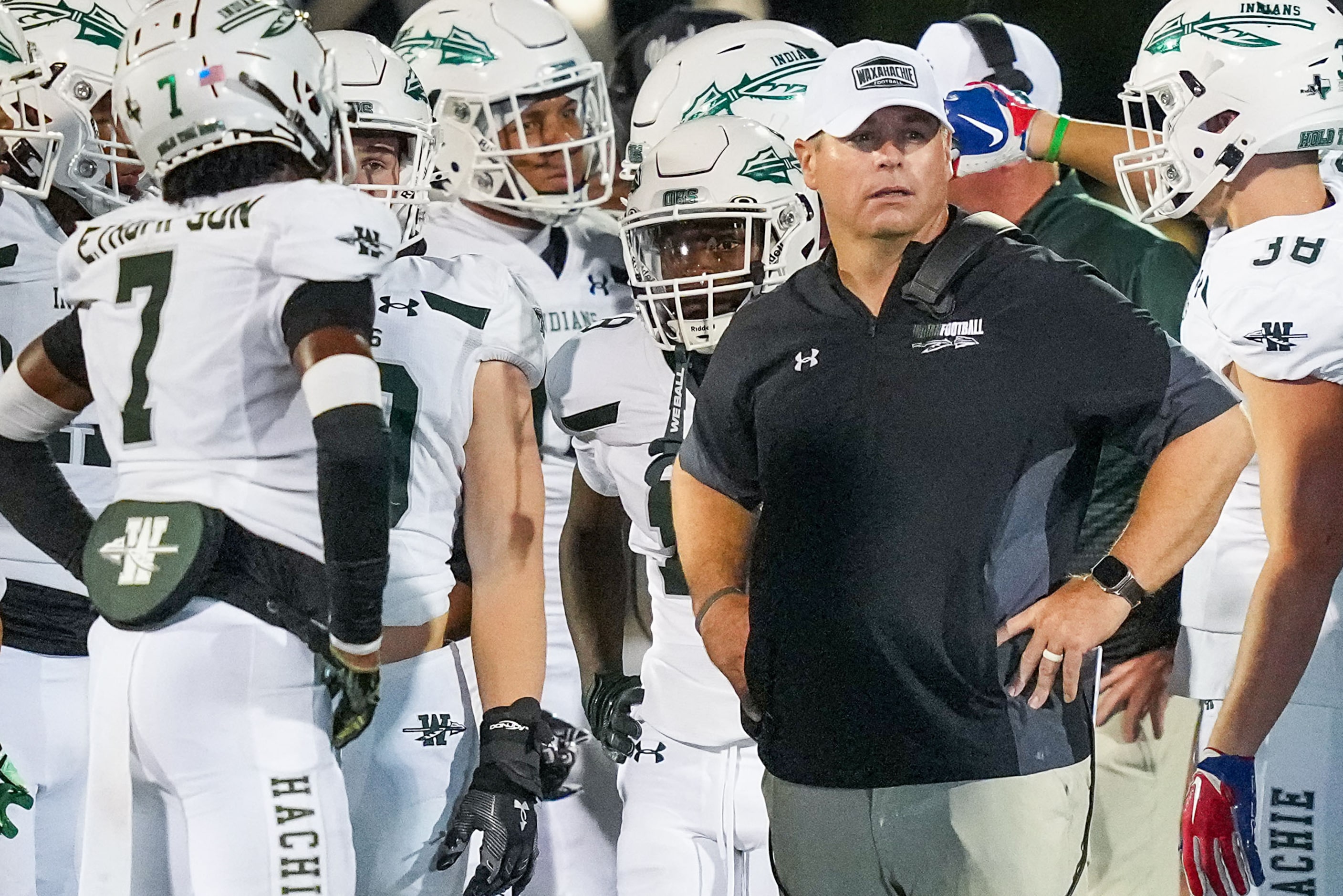 Waxahachie head coach Shane Tolleson looks on during a timeout in the second half of a...