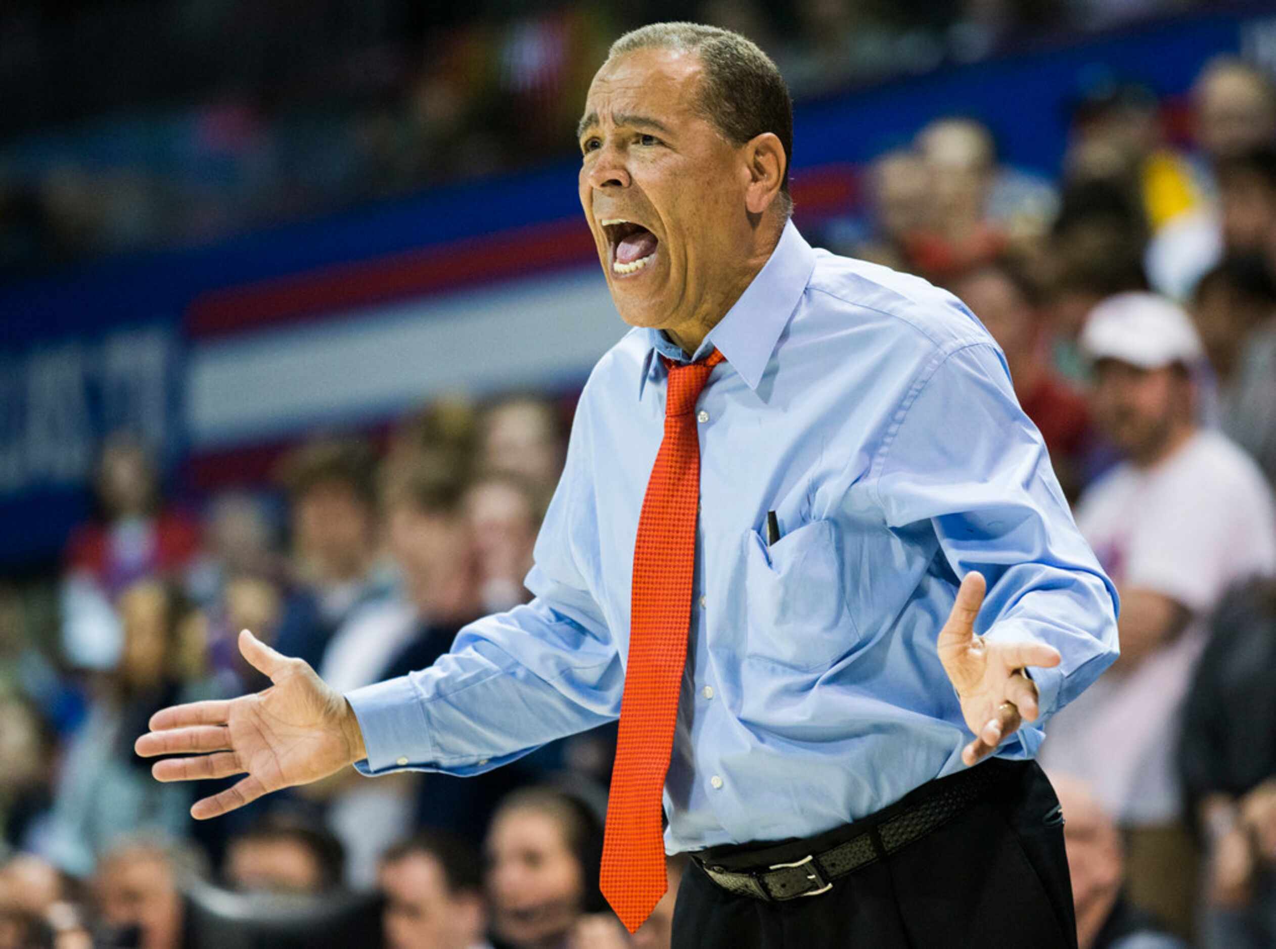 Houston Cougars head coach Kelvin Sampson yells from the sideline during the first half of a...