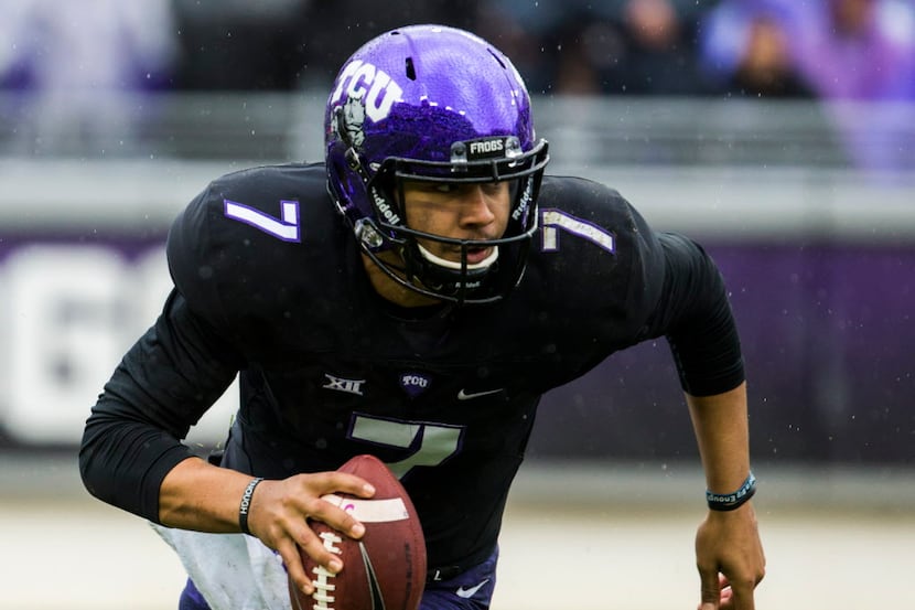 TCU Horned Frogs quarterback Kenny Hill (7) runs the ball during the third quarter of their...