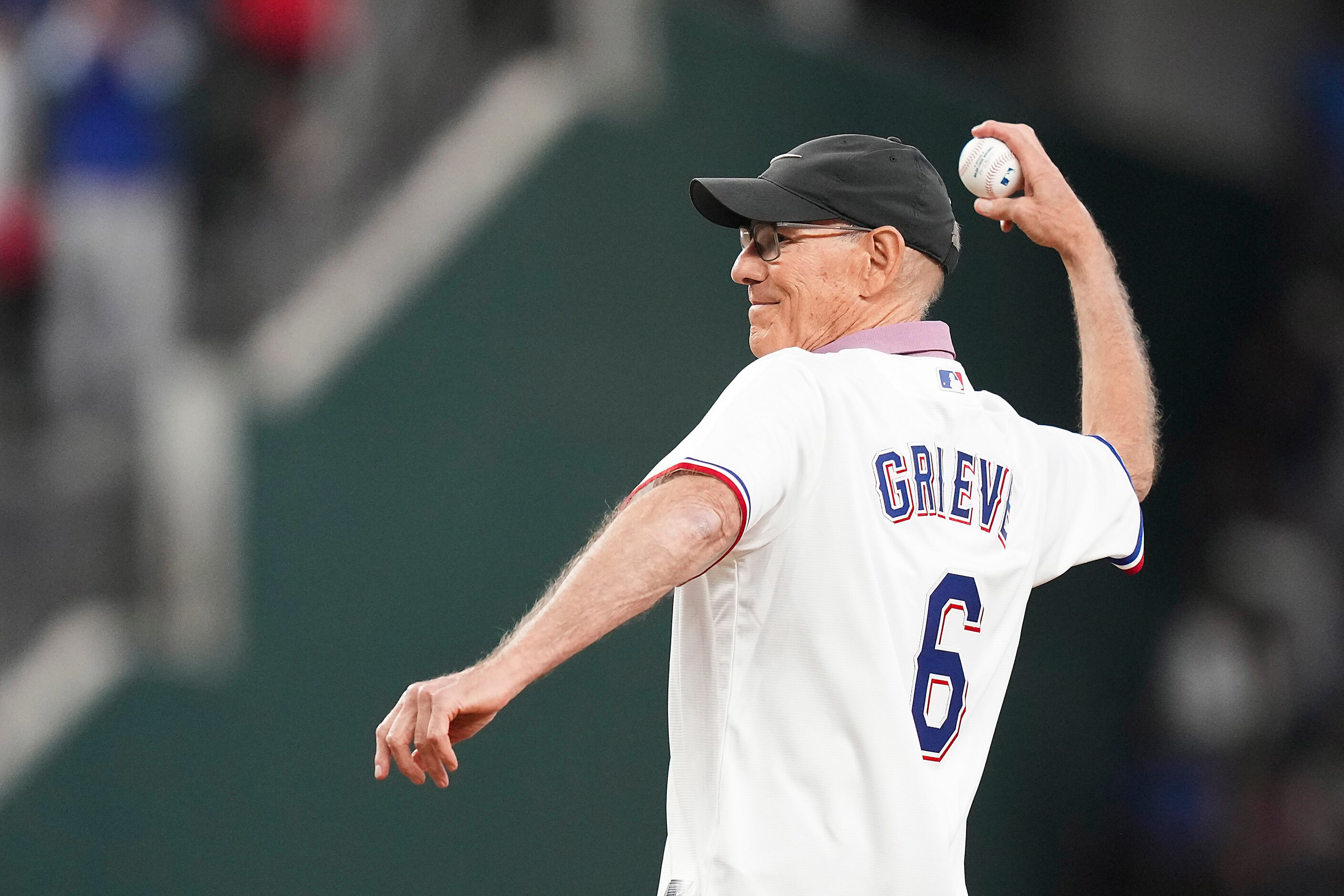 Rangers Hall of Famer Tom Grieve throws the ceremonial first pitch prior to Game 5 of the...