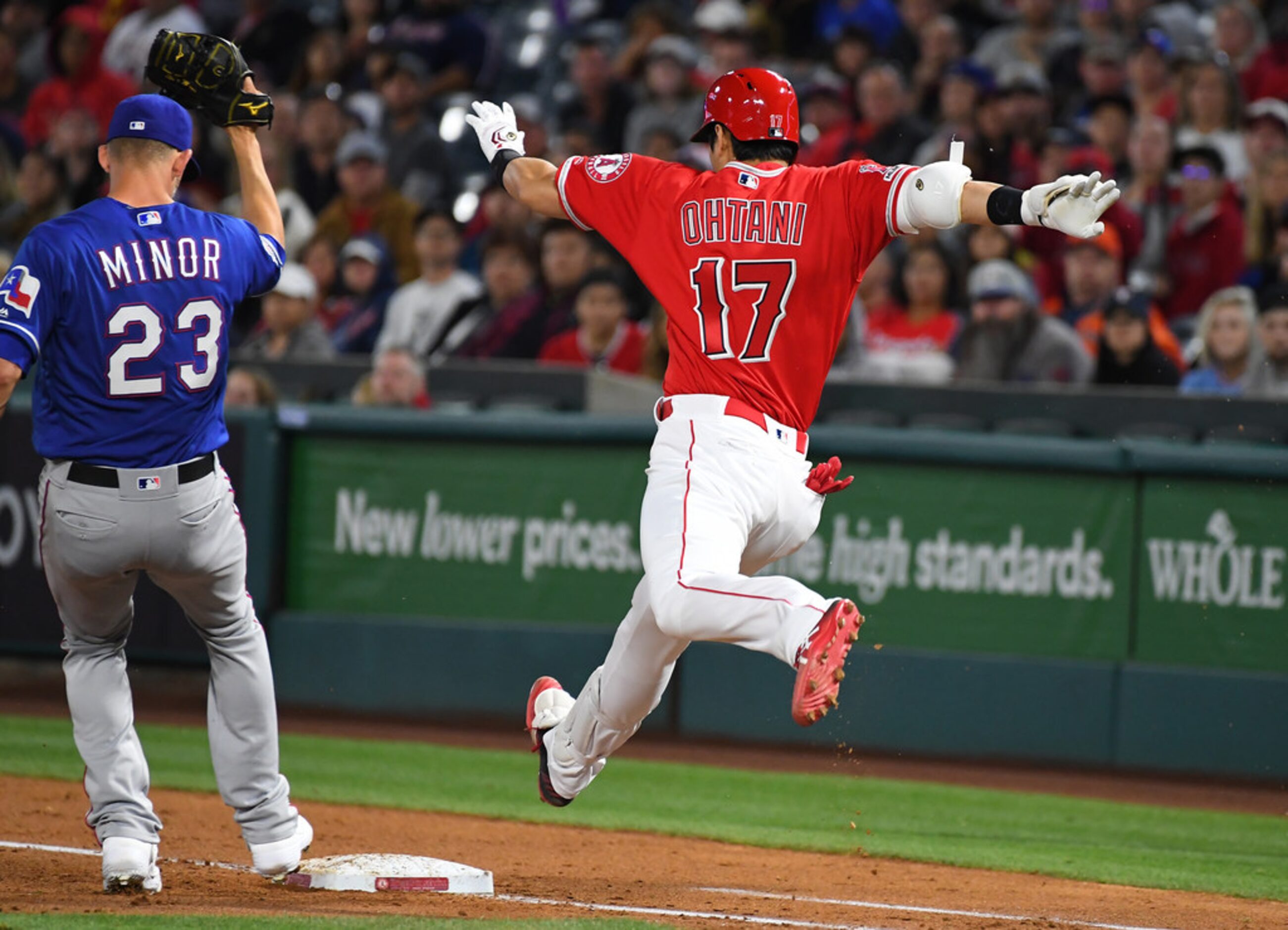 ANAHEIM, CA - MAY 25: Shohei Ohtani #17 of the Los Angeles Angels of Anaheim beat the throw...