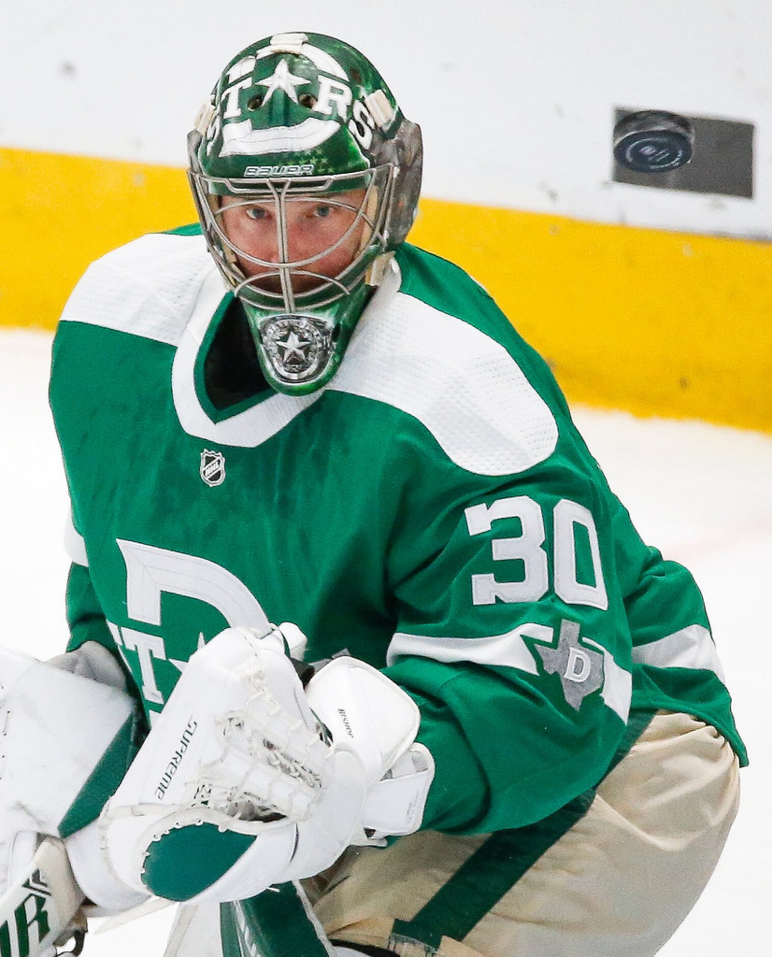 Dallas Stars goaltender Ben Bishop (30) watches the airborne puck during the first period of...