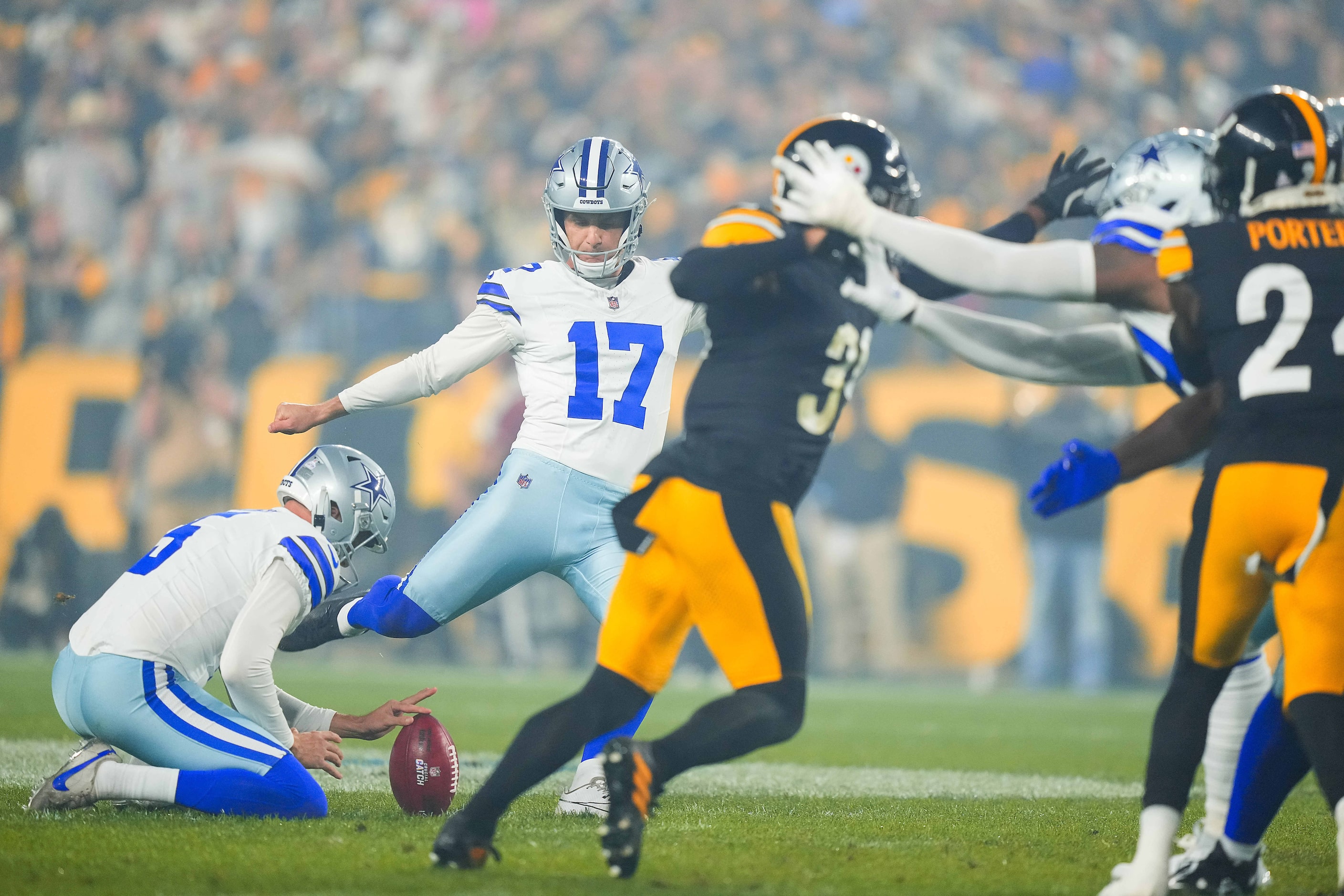 Dallas Cowboys place kicker Brandon Aubrey (17) kicks a field goal during the first half of...