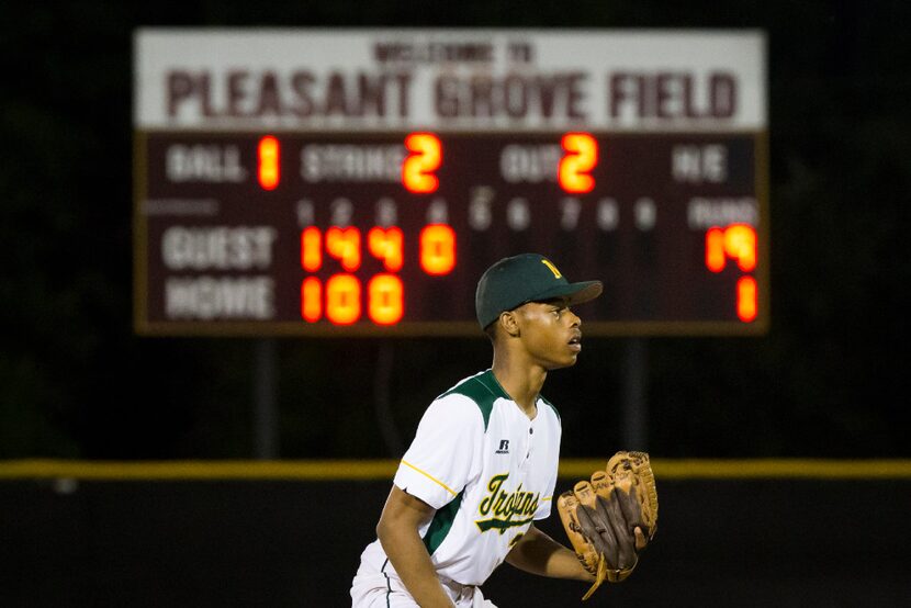 Madison shortstop Juriod Hollie takes his position during the fourth inning as the...