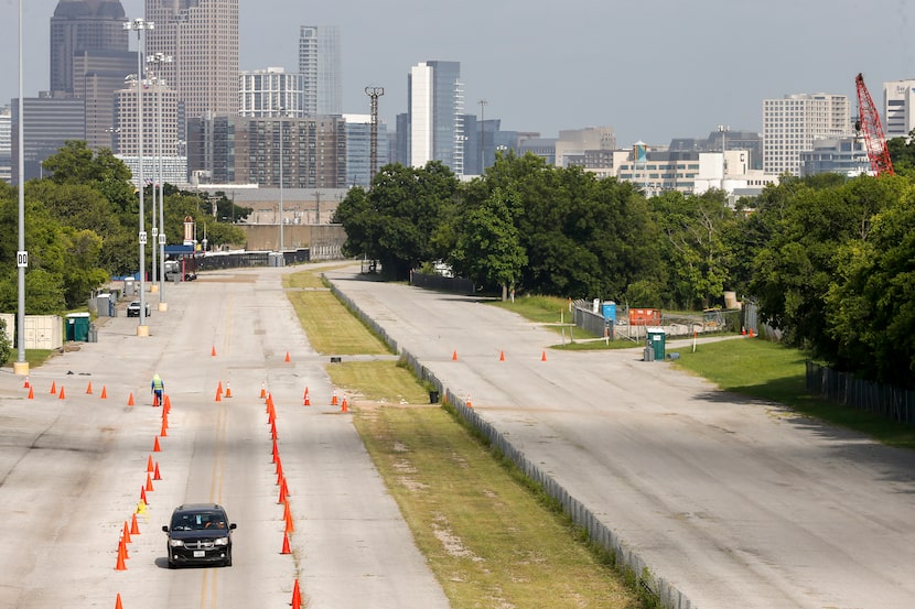 A single vehicle made its way to the Fair Park megasite on July 17, the site’s last day,...