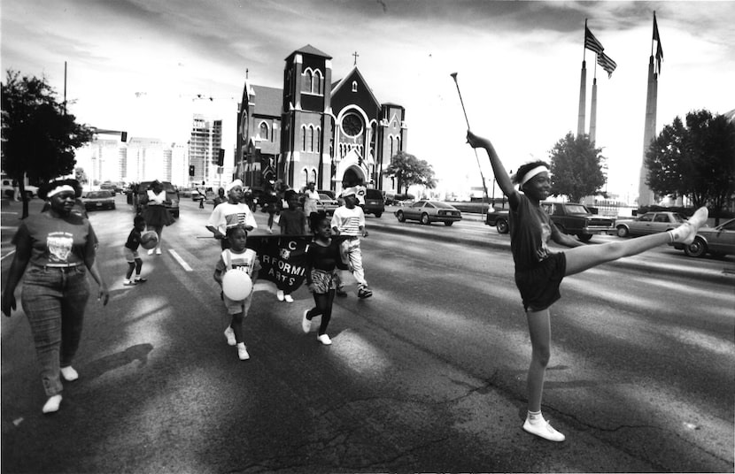 Andrea Lockley led the Charles Rice Performing Arts Marching Group down Pearl Street.