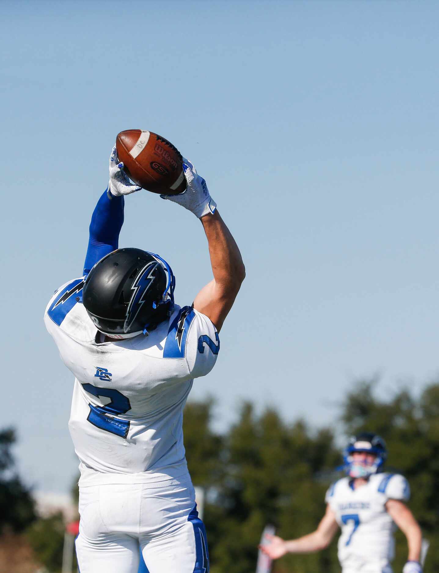 Dallas Christian's Gabriel Grubbs (2) catches a pass from quarterback T.J. King (7) during...