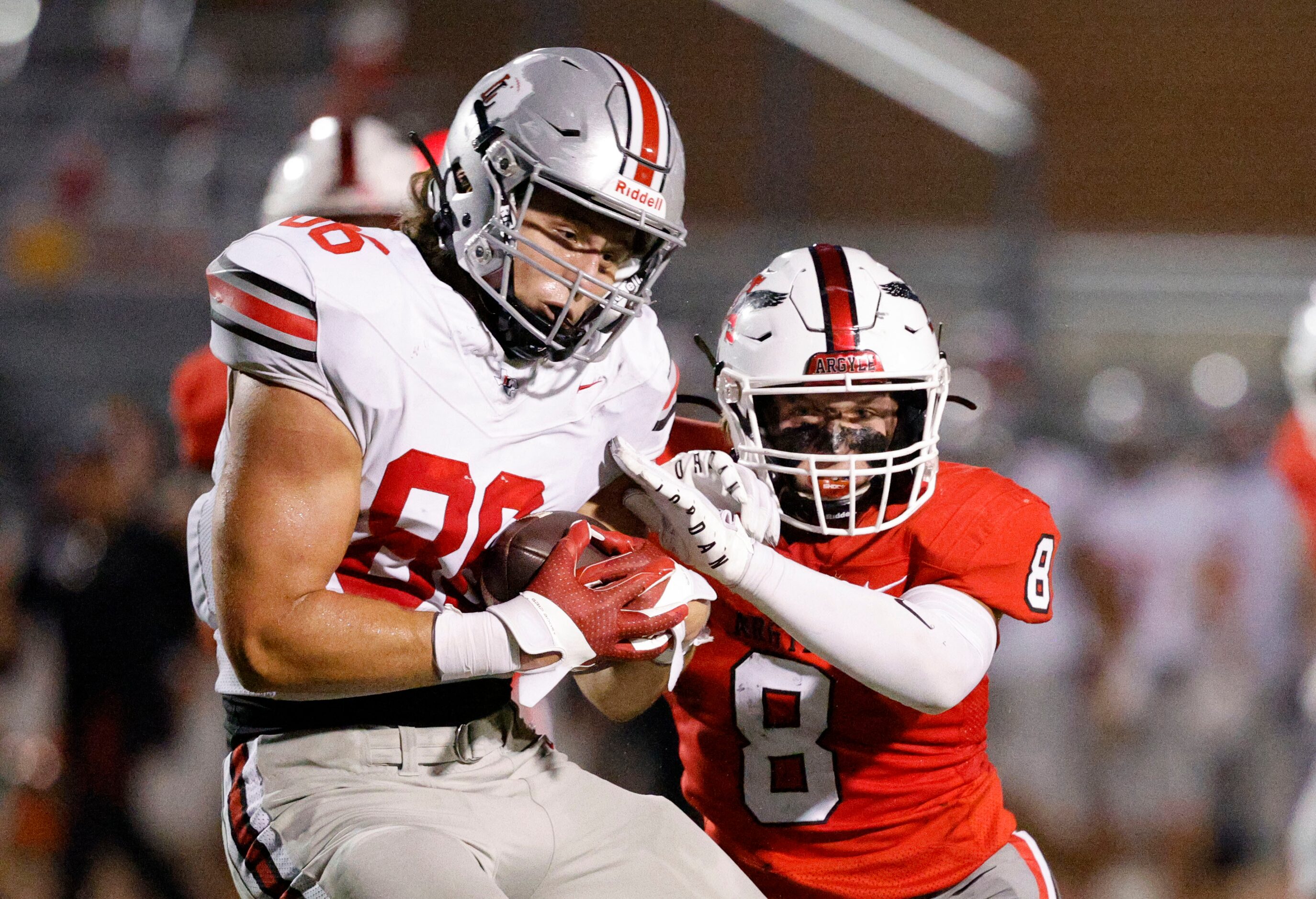 Lovejoy's Ridge Barker (86) keeps a ball away from Argyle's Nathaniel Bruce (8) during the...