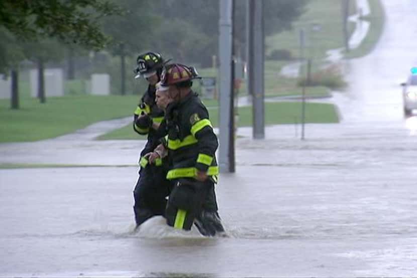 
Lewisville Fire-Rescue personnel helped a stranded motorist at Waters Ridge Drive and...