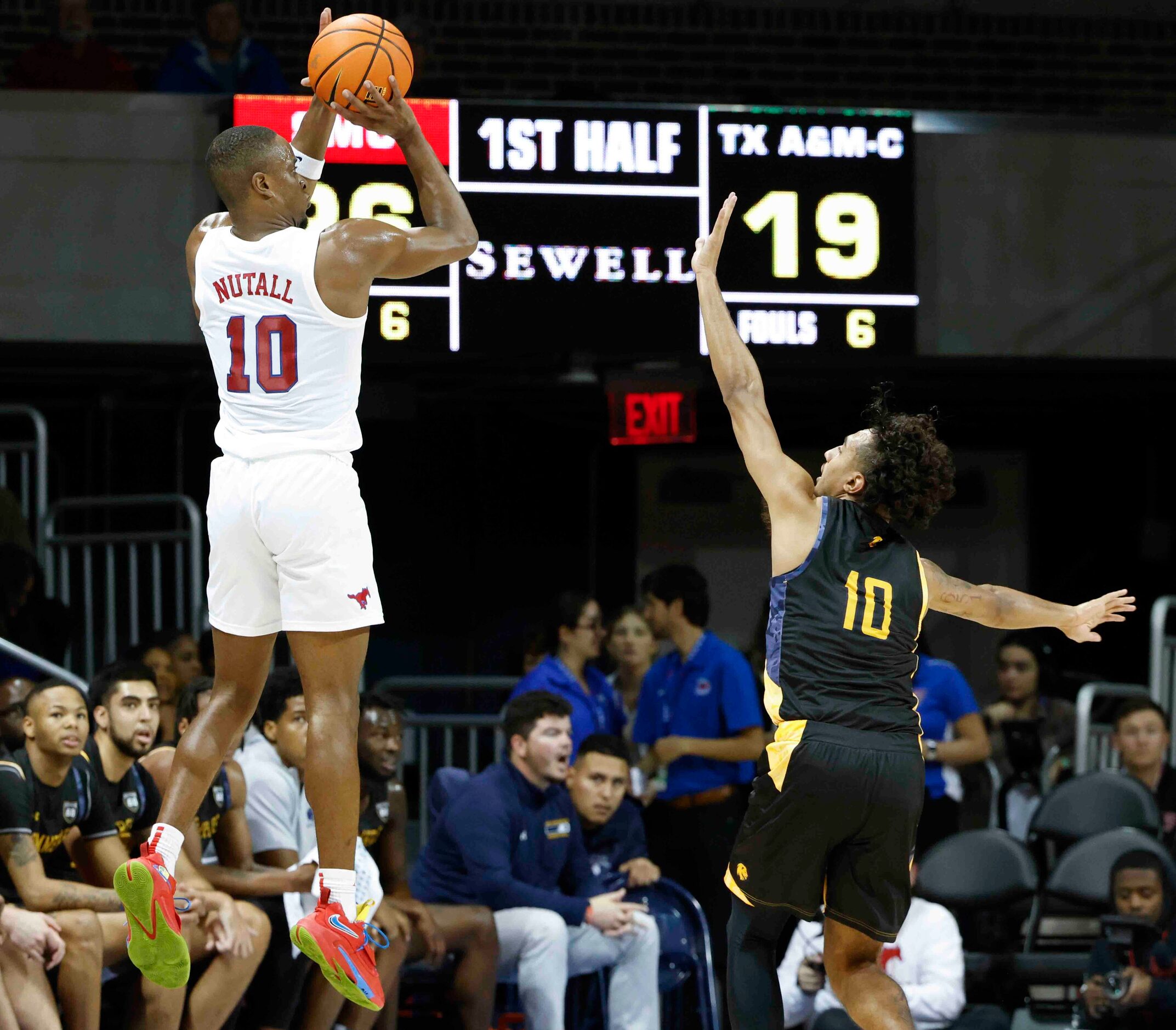 Southern Methodist guard Zach Nutall (10) attempts for a three-pointer as Texas A&M-Comm’s...