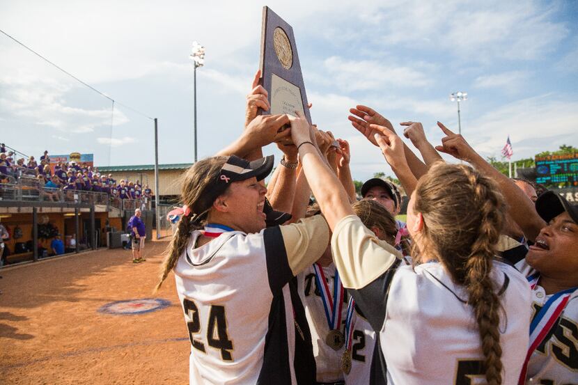 The Colony celebrates winning the UIL 5A state softball championship at McCombs Field in...