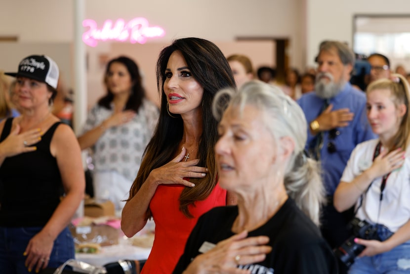 Penny Nance, President and CEO of Concerned Women for America, sings the National Anthem...