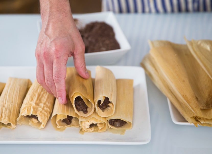 Eddie Garza makes vegan black bean tamales in his apartment on Wednesday, December 21, 2016...