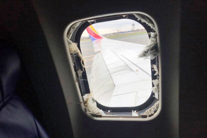 View of the blown-out window from Southwest Airlines Flight 1380 at Philadelphia...