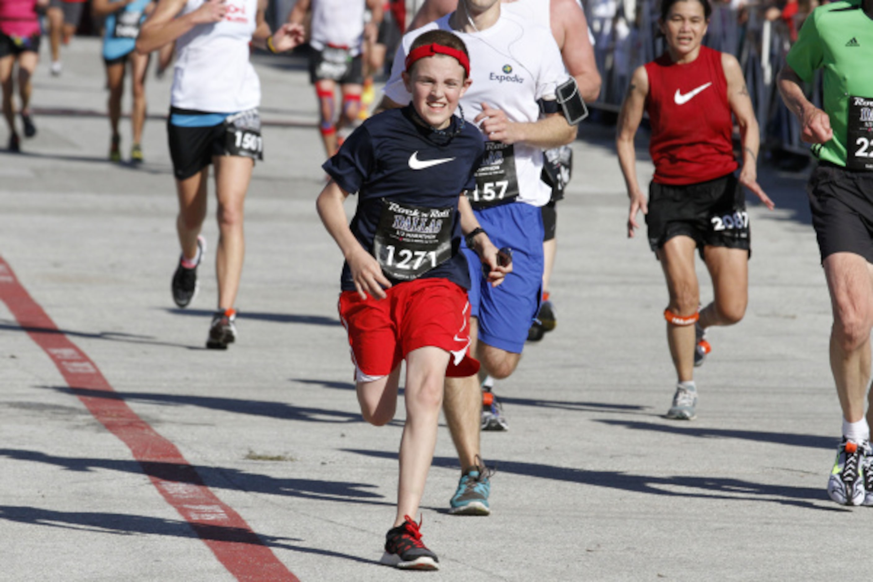 Hunter Hart of Haslet, runs in the Dallas Rock 'N' Roll half marathon on Sunday, March 25,...