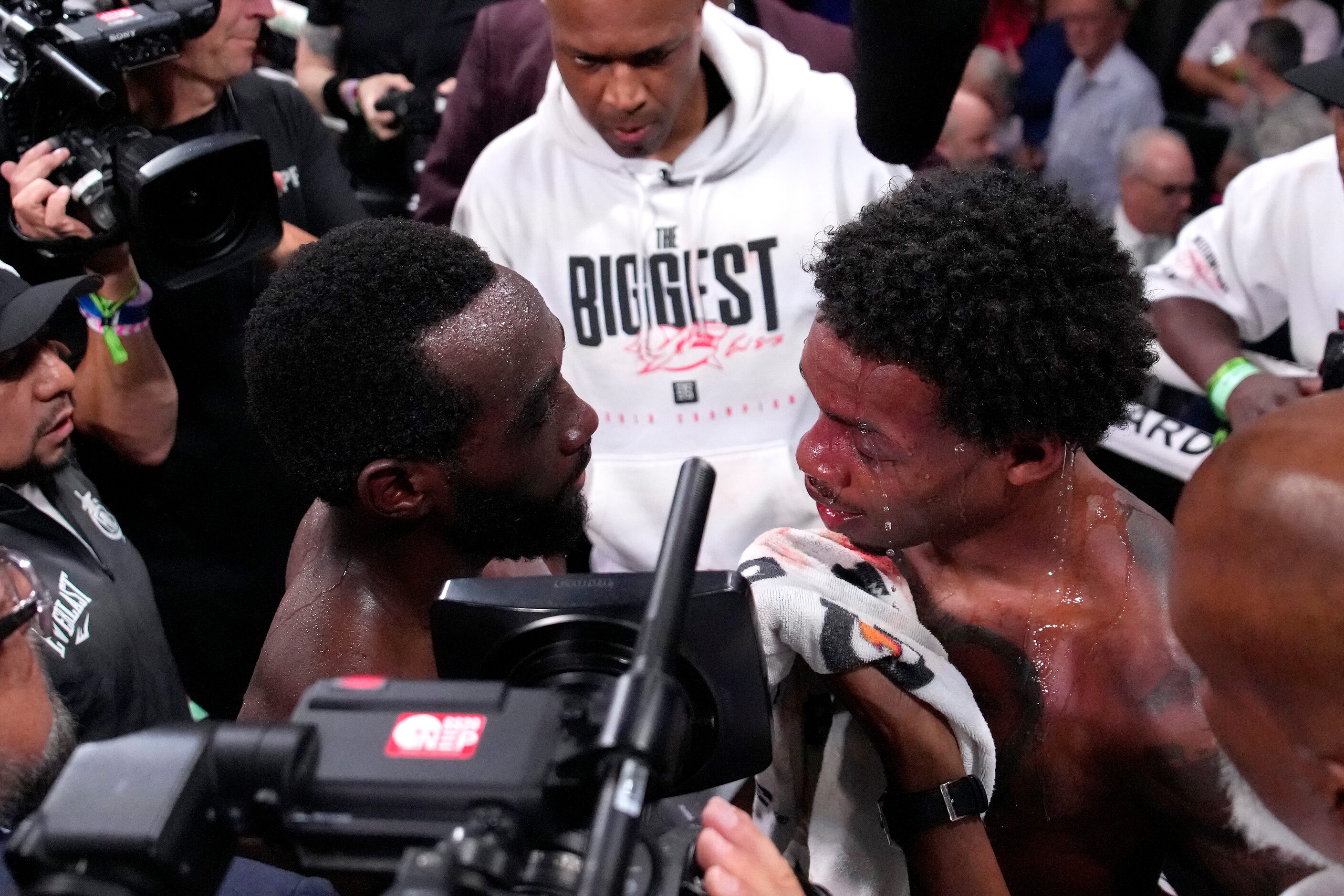 Terence Crawford, left, talks with Errol Spence Jr. fight after Crawford won their...