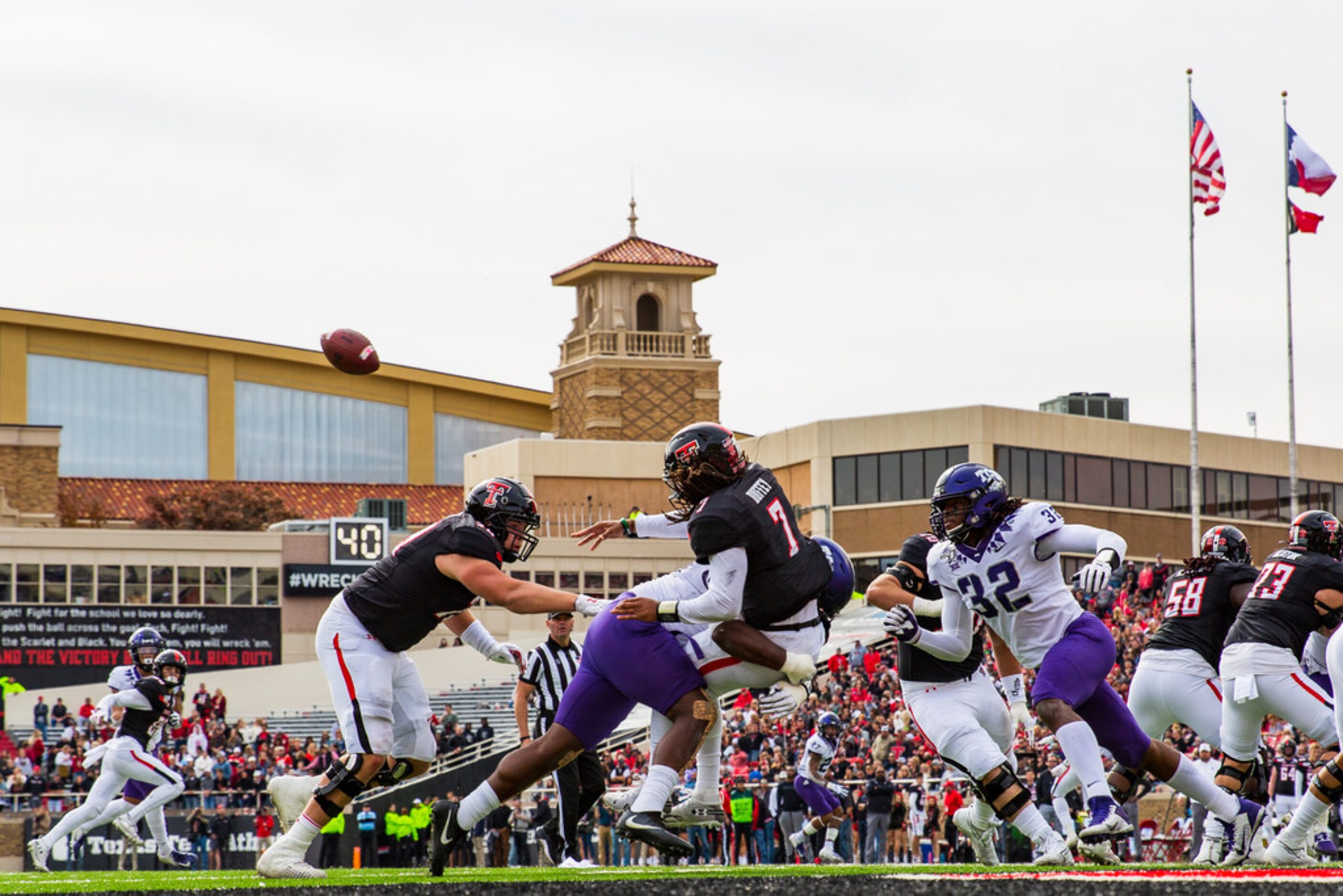 LUBBOCK, TEXAS - NOVEMBER 16: Quarterback Jett Duffey #7 of the Texas Tech Red Raiders is...