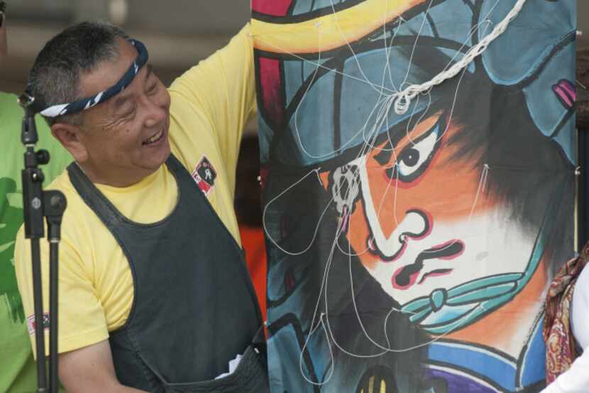 Shigeki Endo, a master kite-maker, presented a traditional Japanese kite to the city of...