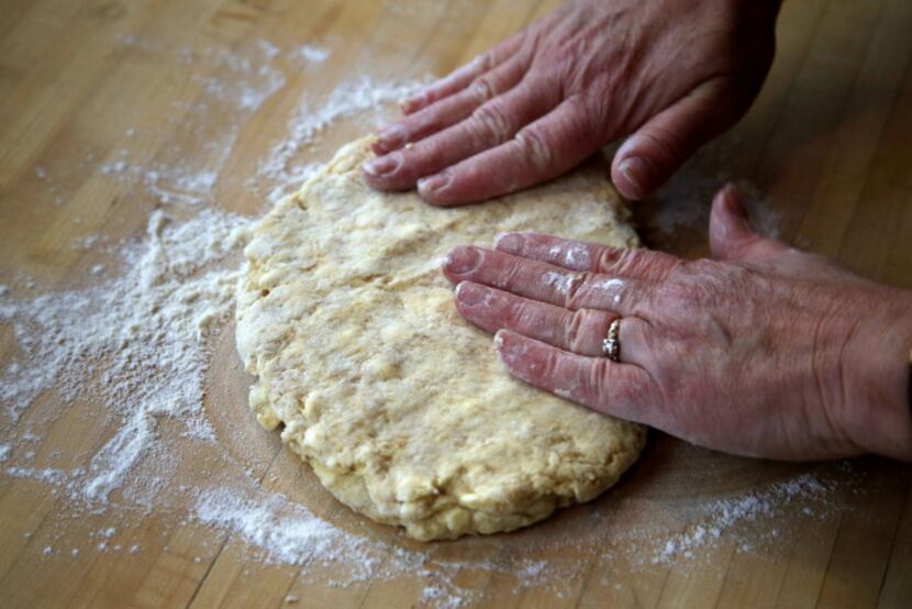 When making shortcake, turn dough out onto a lightly floured counter and knead lightly until...