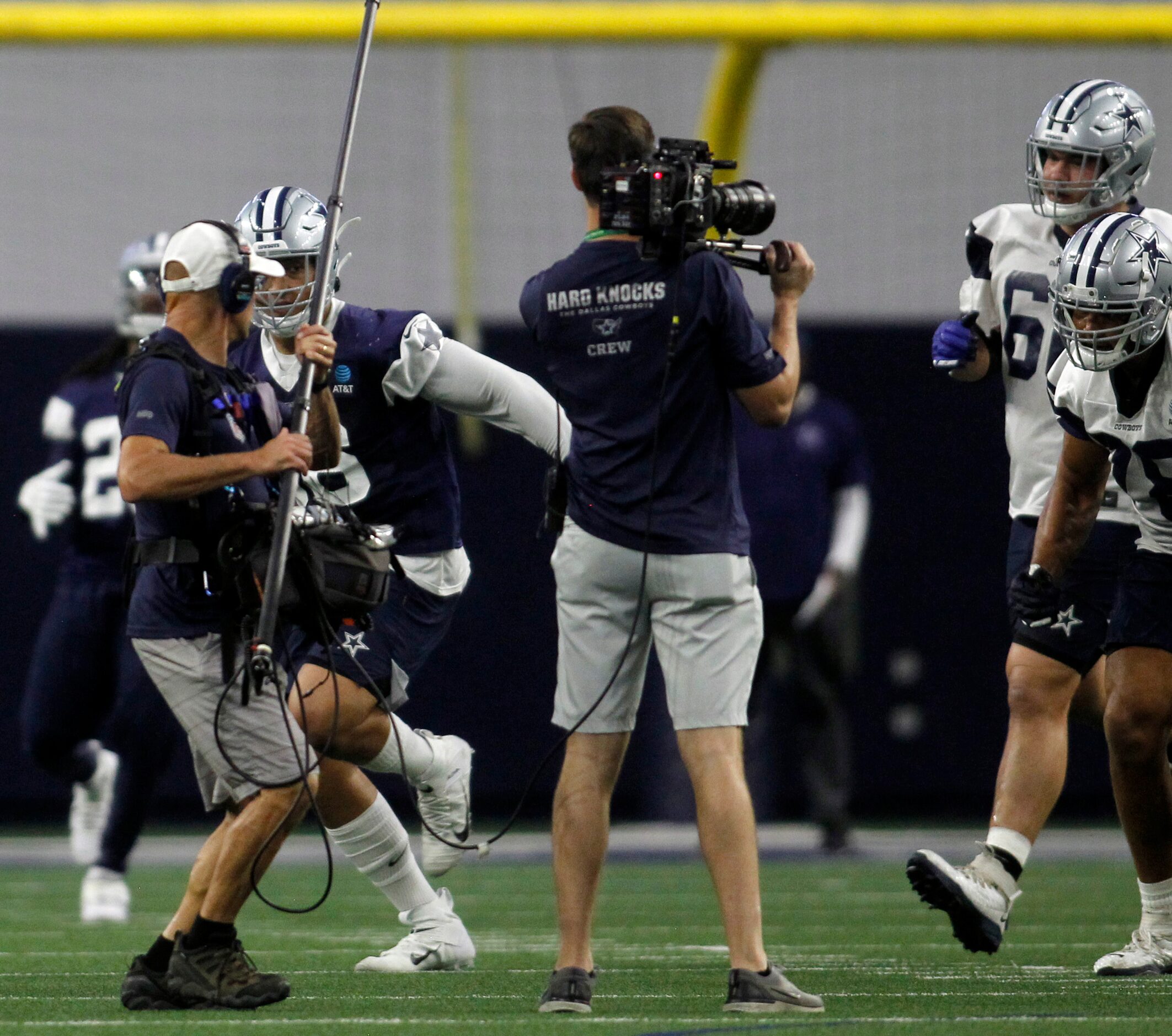 A Hard Knocks film crew film a team practice session. The Cowboys conducted their final...