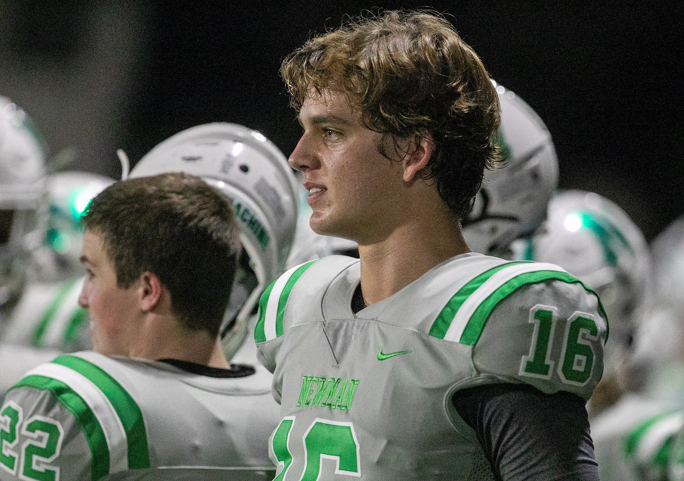 Arch Manning watches the action from the sideline as Newman High School takes on Riverside...