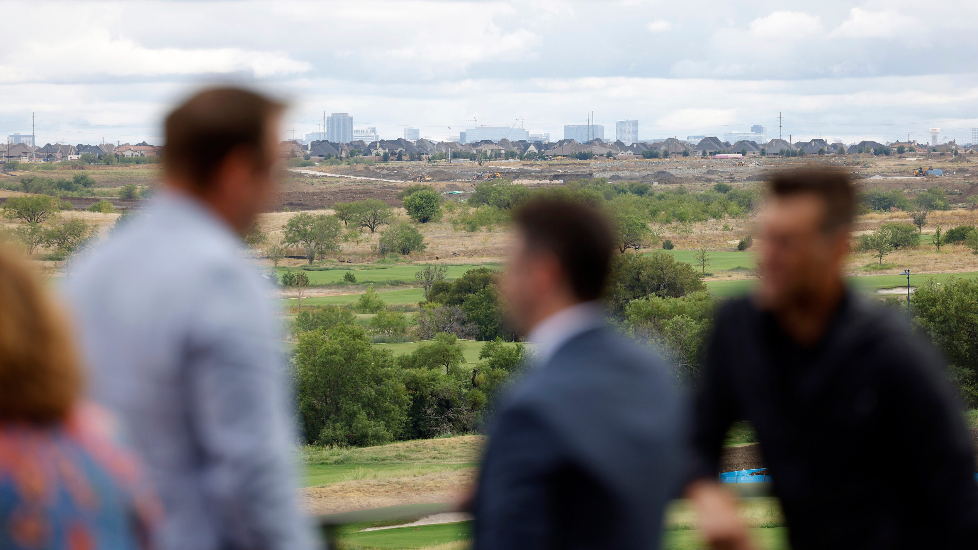 People enjoy the view of the facility from the fourth floor of the PGA of America...