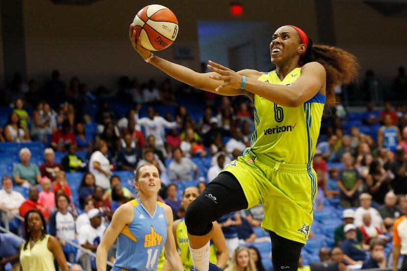 Dallas Wings forward Kayla Thornton (6) attempts a layup during the first overtime in a game...