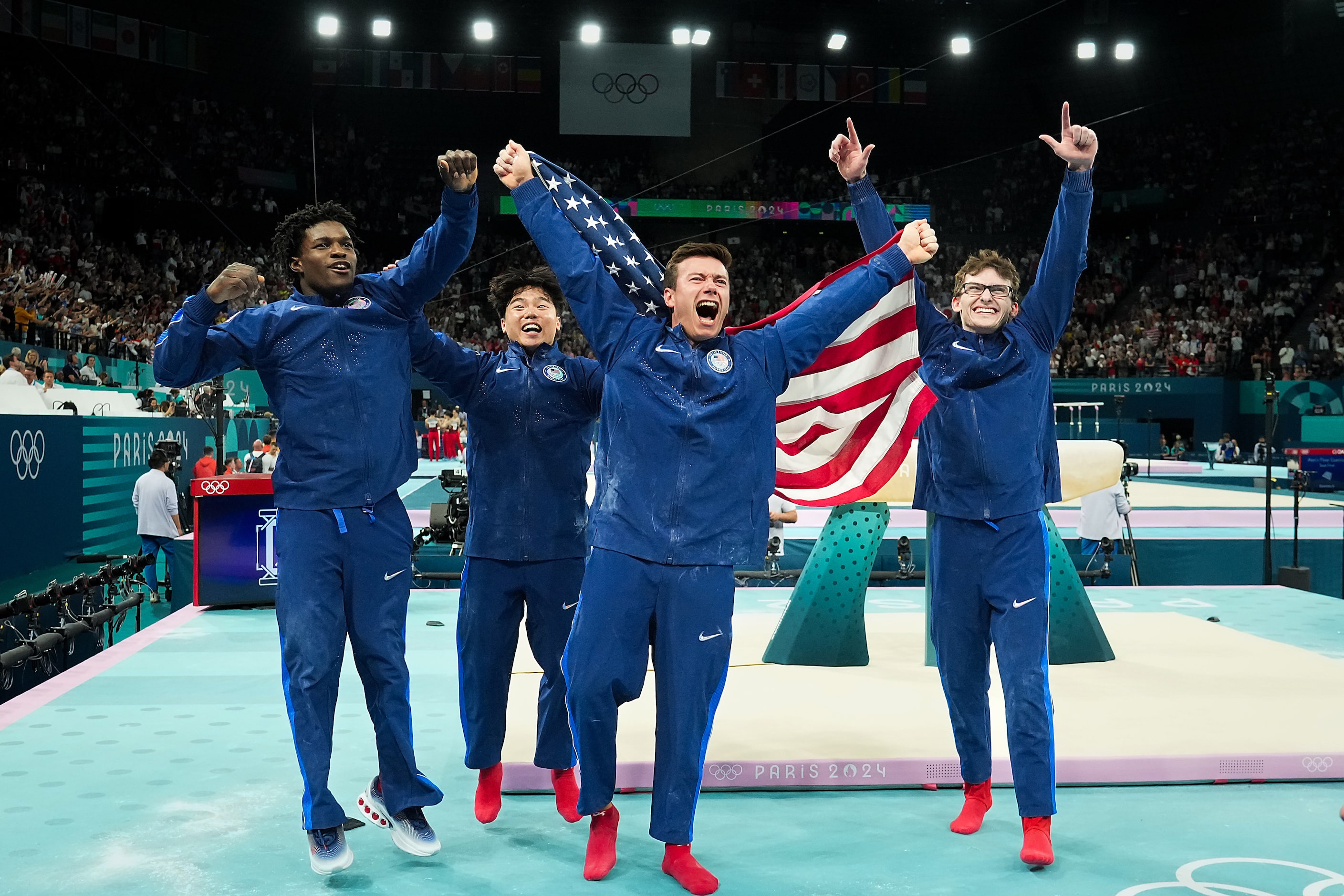 Frederick Richard (from left) Asher Hong, Brody Malone and Stephen Nedoroscik of the United...