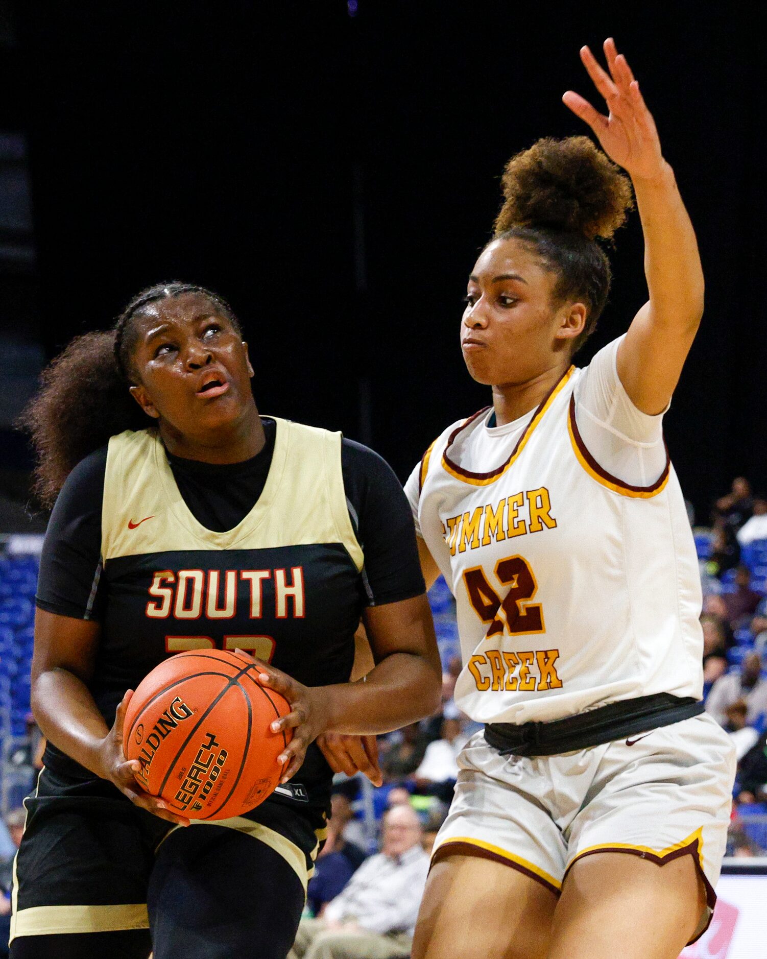 South Grand Prairie forward Cedraiah Peterson (32) drives to the basket against Humble...