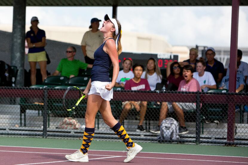Highland Park High School' Logan Lett celebrates after a point in a Girl's Doubles match...