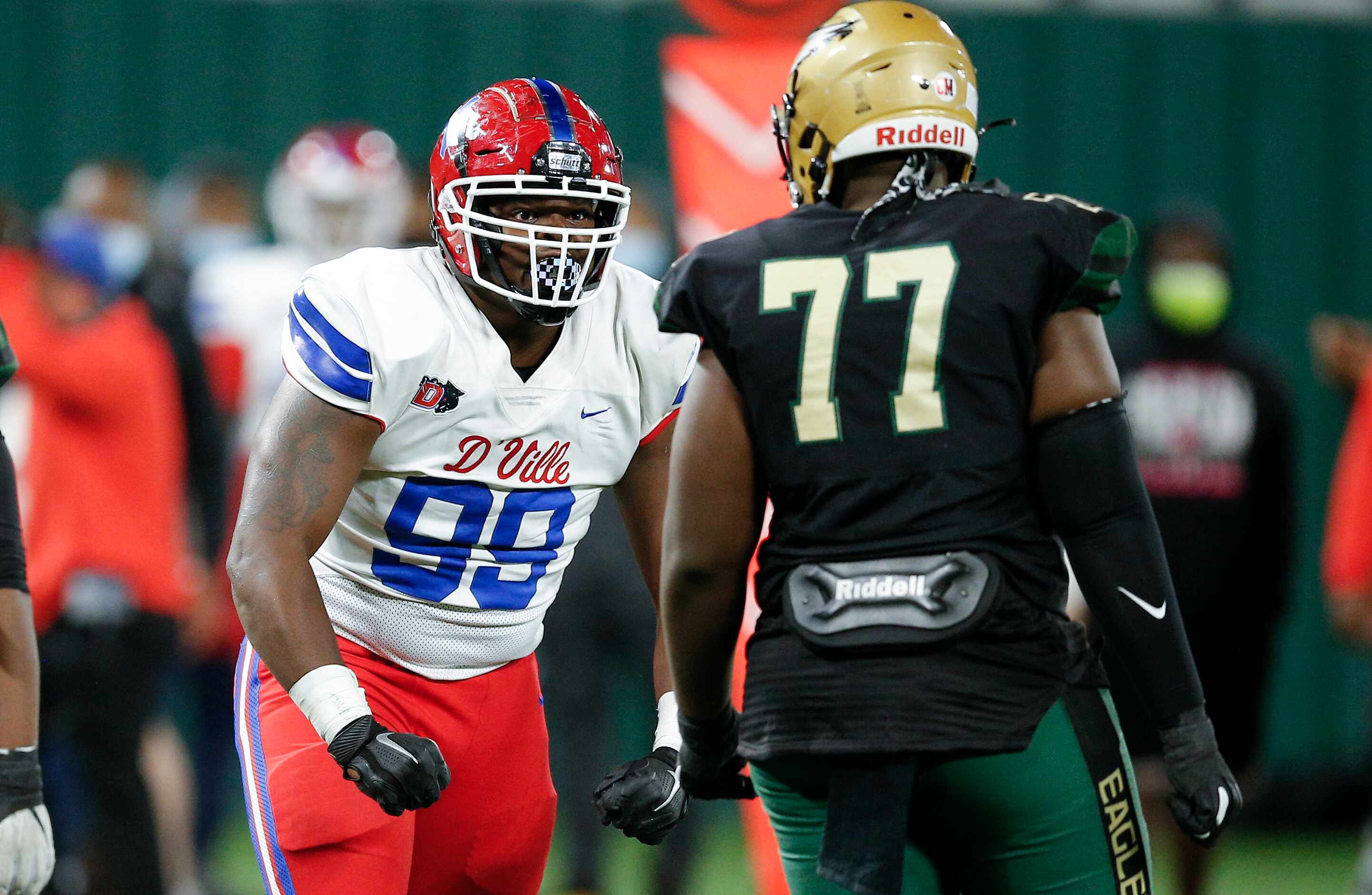 DeSoto junior guard Joshua Straw (77) looks on as Duncanville junior defensive tackle Quincy...