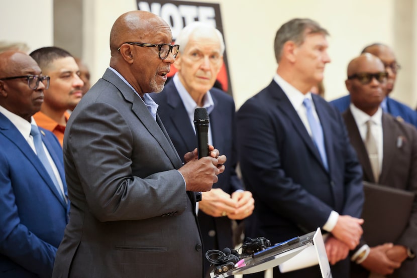 Former Dallas Mayor Ron Kirk speaks during a news conference announcing an organized effort...