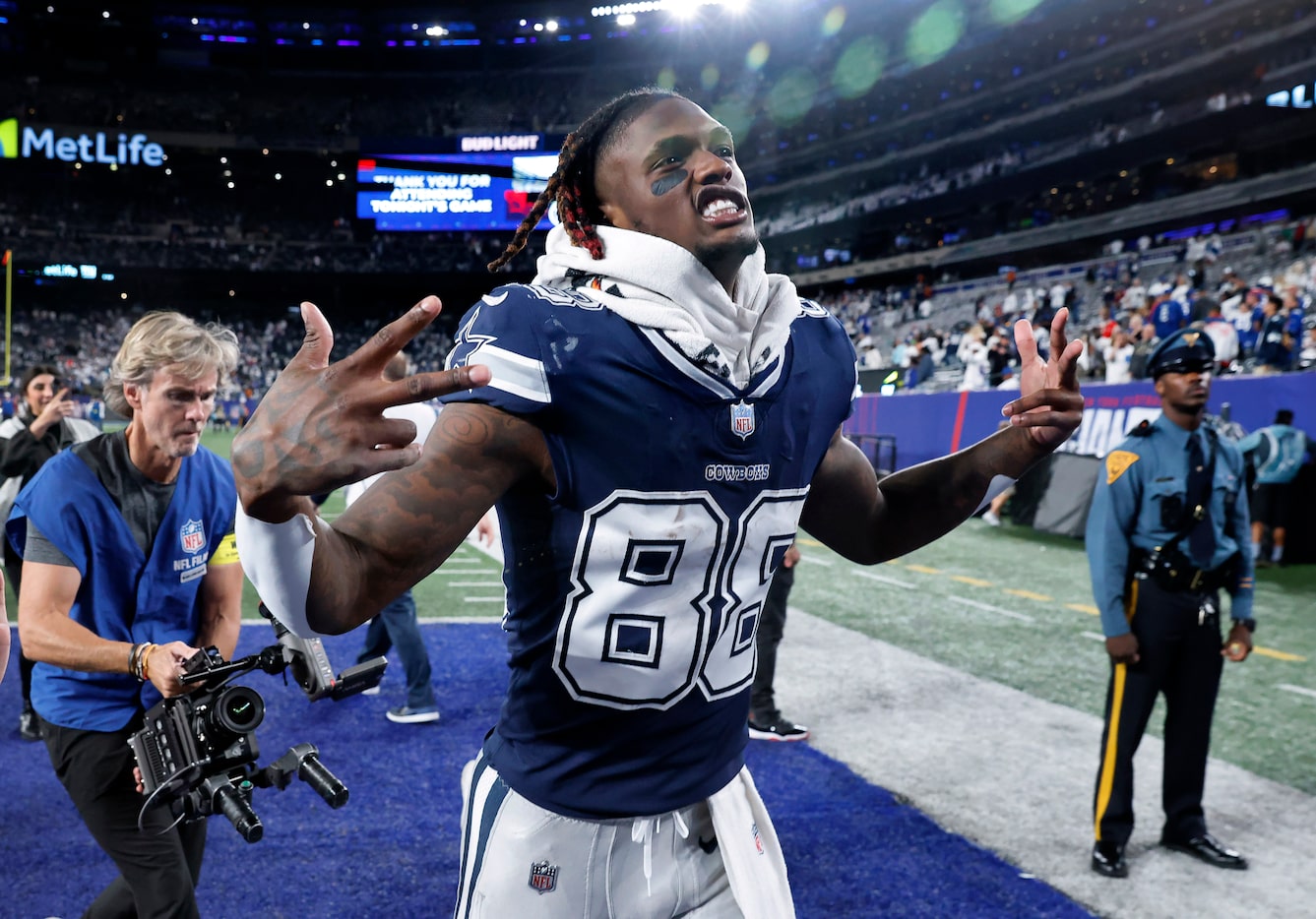 Dallas Cowboys wide receiver CeeDee Lamb (88) celebrates their win over the New York Giants...