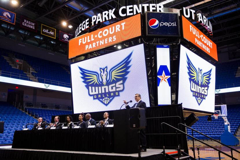President and CEO David Swatzell unveils the name and logo of the Dallas Wings, a new WNBA...