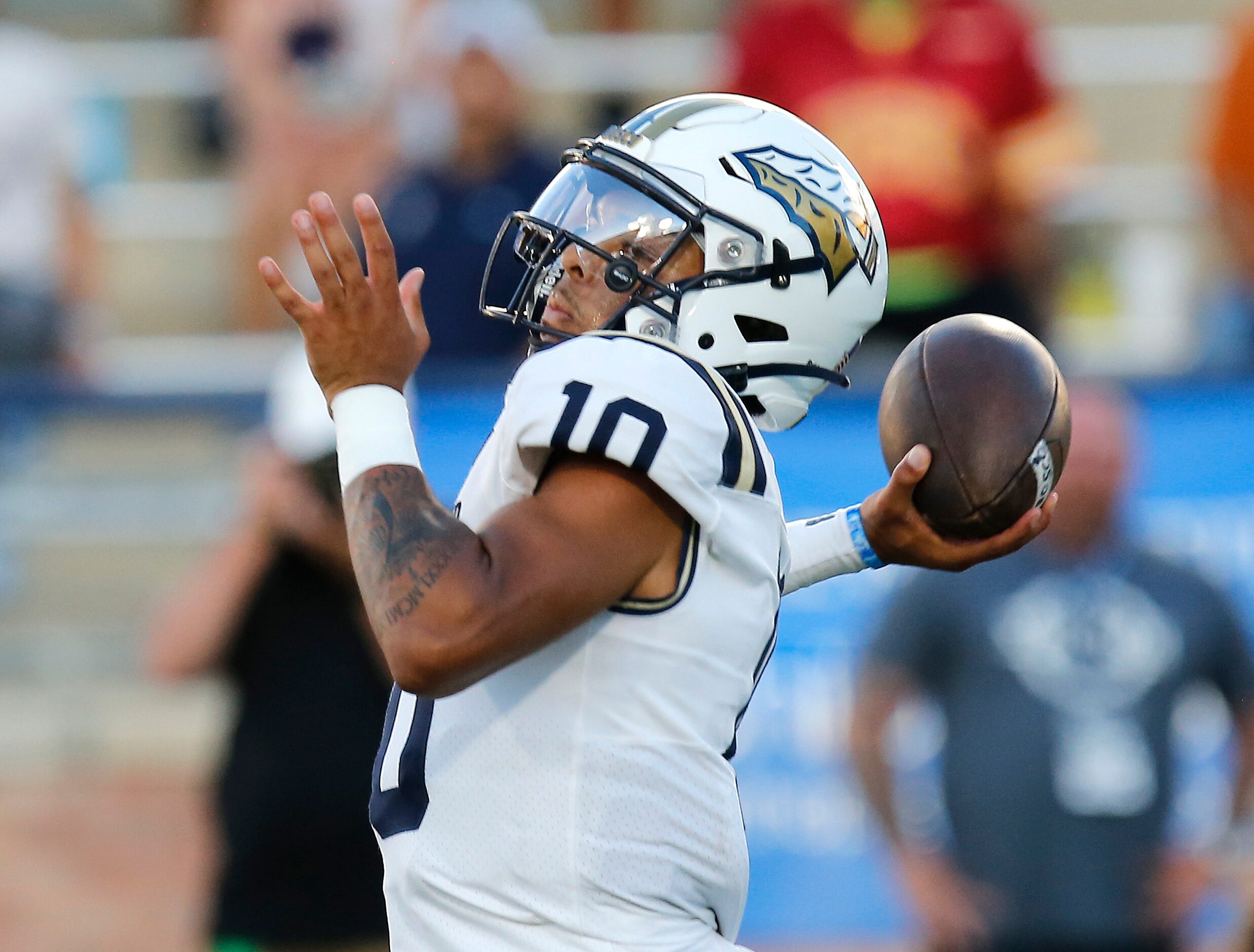 St. John Bosco High School quarterback Pierce Clarkson (10) throws a pass during the first...