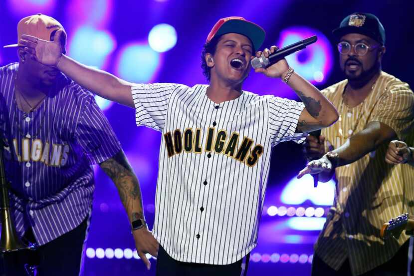 In this Sunday, June 25, 2017, file photo, Bruno Mars performs "Perm" at the BET Awards at...