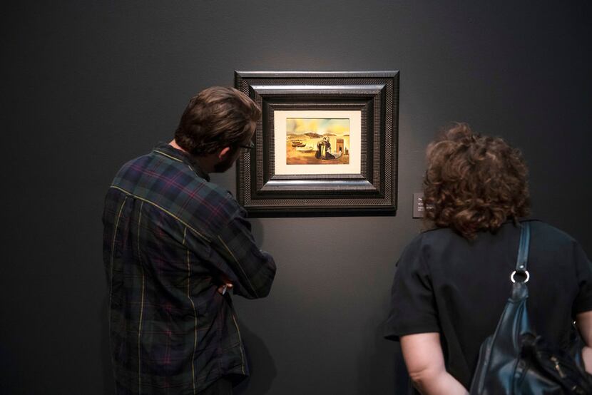 Visitors hecked out a preview of the Salvador Dalí exhibition at the Meadows Museum at...