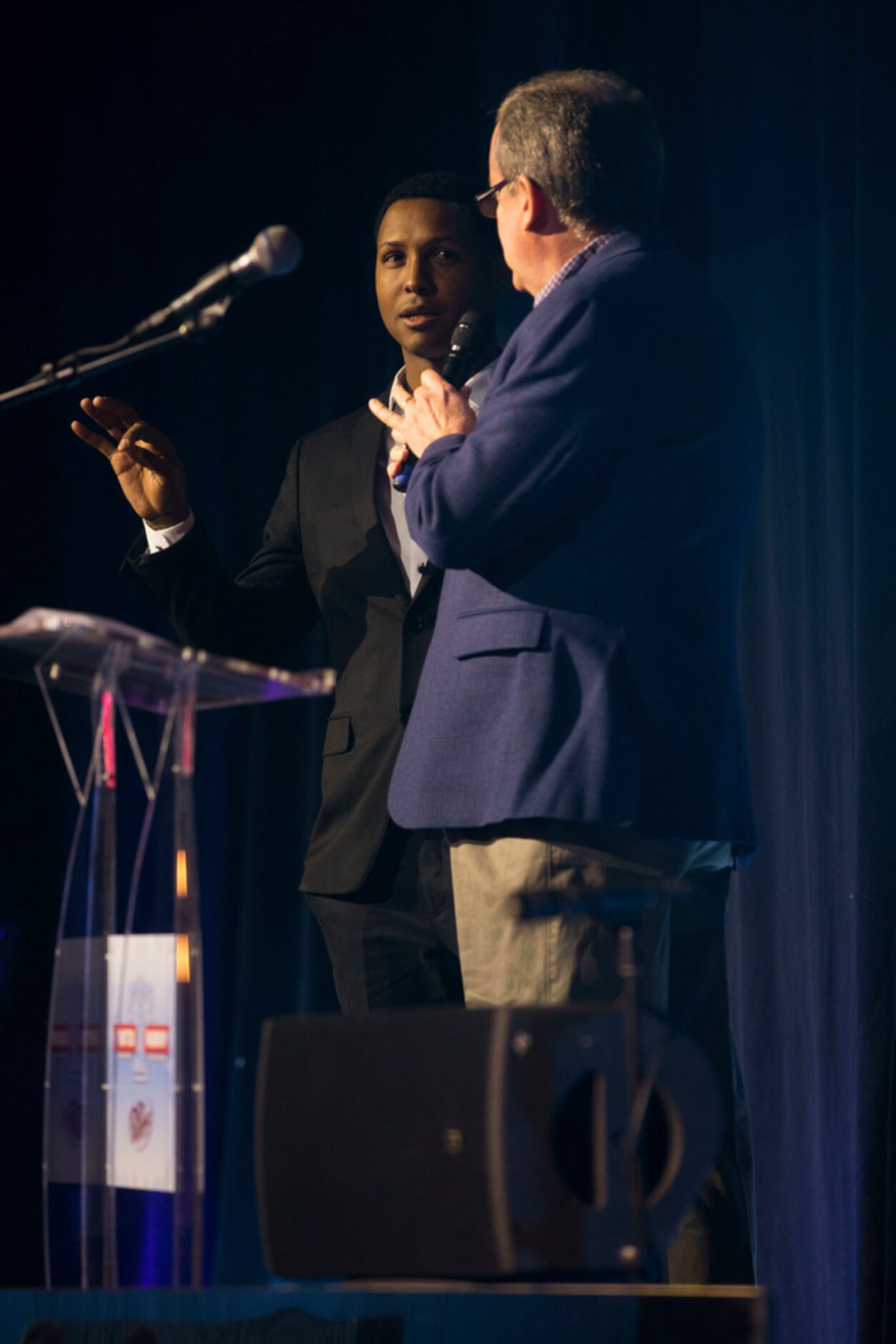 Ranger pitcher JosÅ½ Leclerc, who 2018 Texas Rangers Pitcher of the Year award, left, speaks...