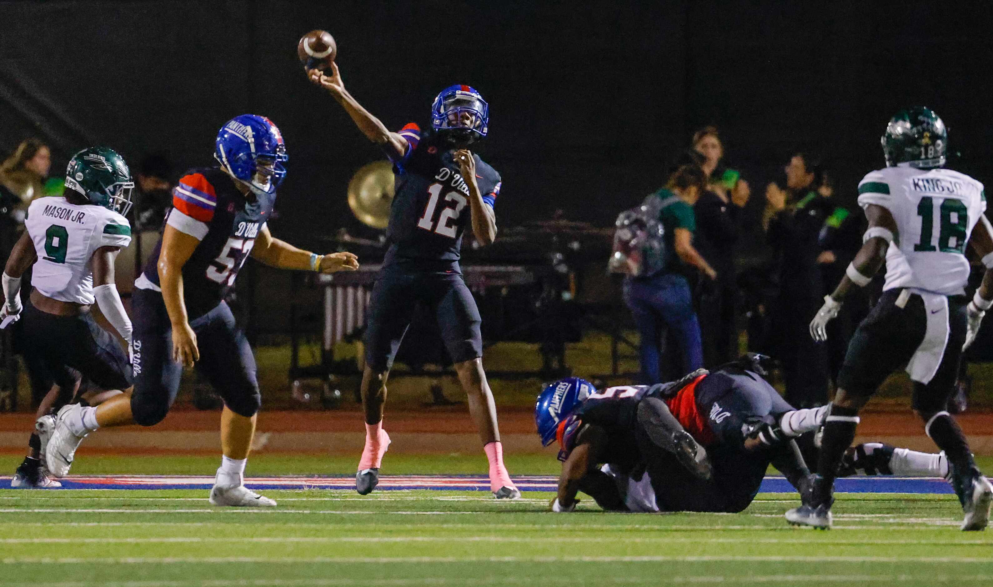 Duncanville quarter back Keelon Russell (12) releases a pass in the first half of a game...