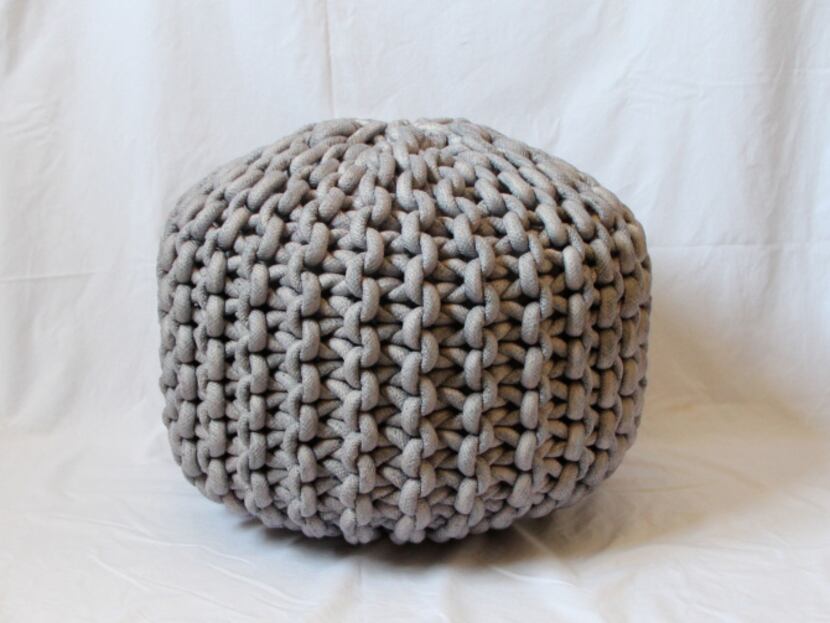 MADE BY HAND: Etsy artisan Cara Corey of MaryMarieKnits uses extra-large knitting needles...
