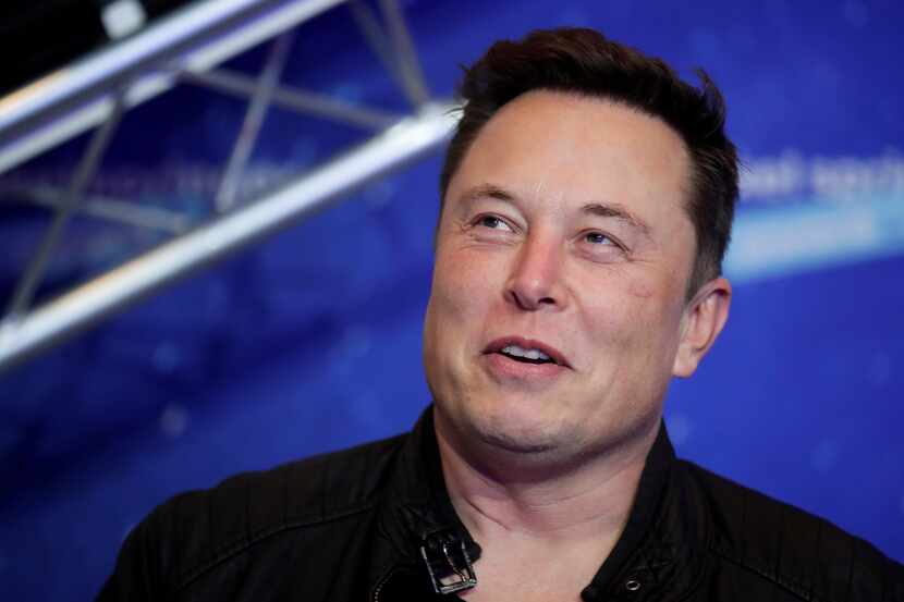 FILE - Tesla and SpaceX CEO Elon Musk arrives on the red carpet for the Axel Springer media...