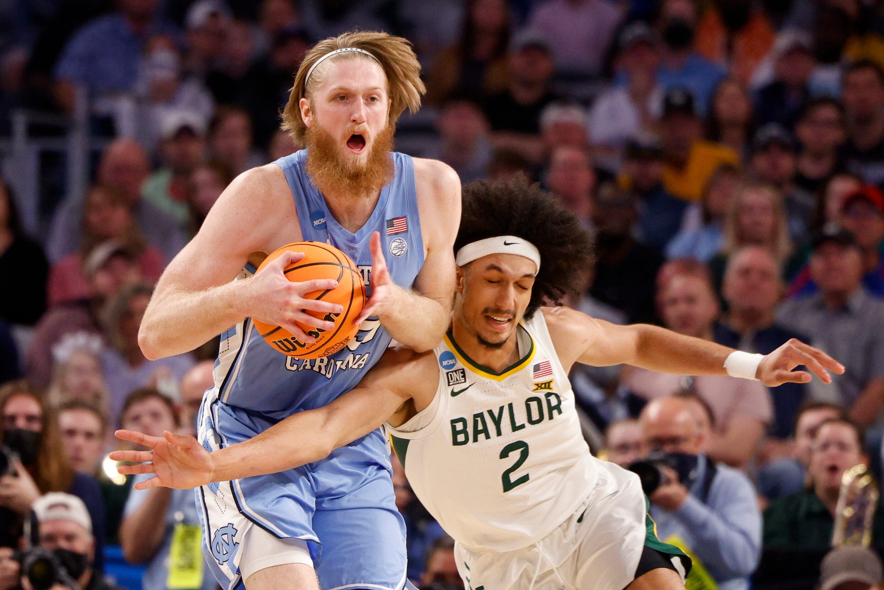 Baylor Bears guard Kendall Brown (2) reaches tries for the steal on North Carolina Tar Heels...