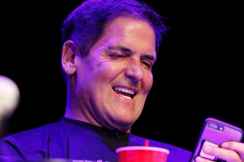 Mark Cuban looked at his cellphone during an event at the Granada Theater in August 2017....
