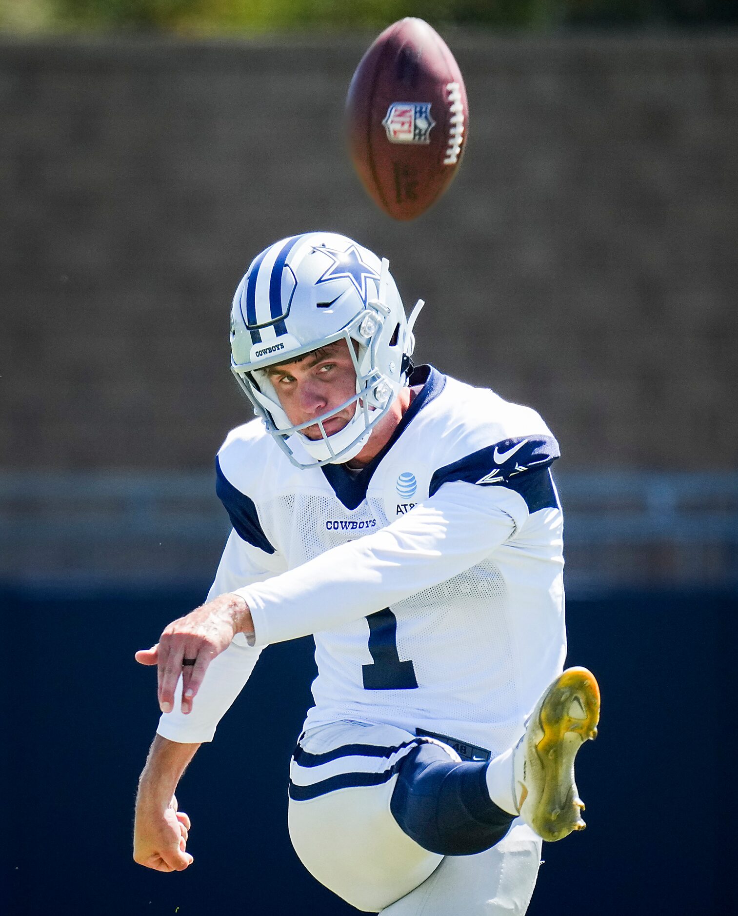 Dallas Cowboys kicker Brandon Aubrey attempts a field goal during a training camp practice...