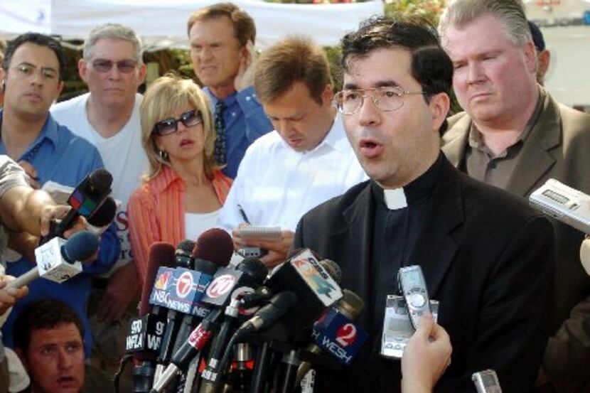 Father Frank Pavone speaks to reporters shortly after it was announced Terri Schiavo had...