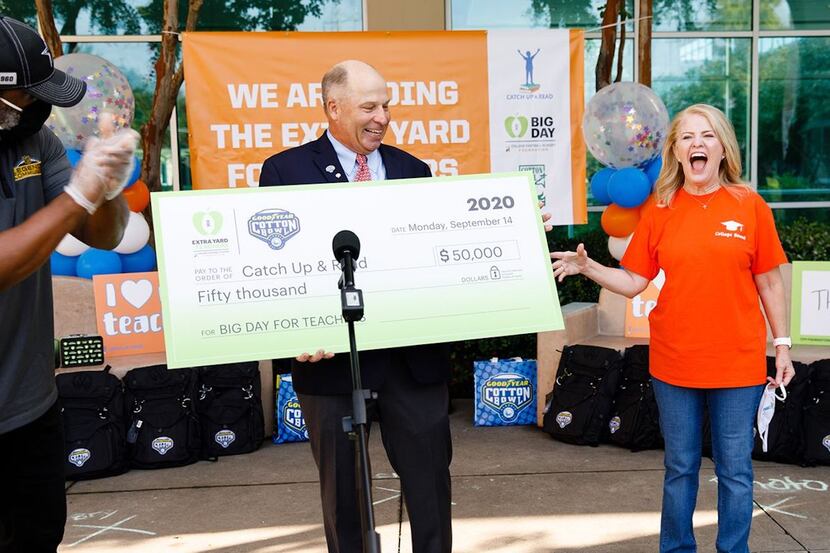 Cotton Bowl Athletic Association chairman Bry Patton presents a check for $50,000 to Catch...
