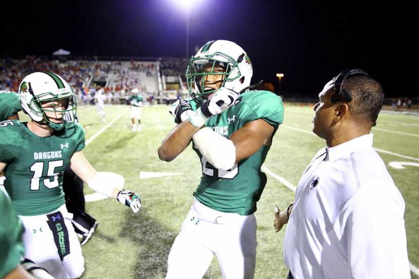 Southlake Carroll's Obi Eboh (23) celebrates after stopping a last-minute drive by Austin...